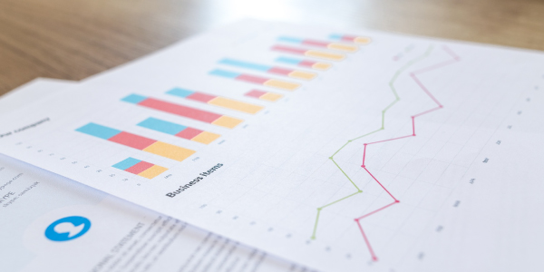 Photo of annual report graphs on desk