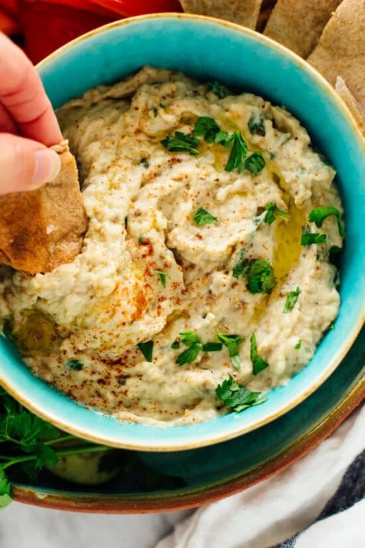 Baba Ganosh made from roasted eggplant, tahini, garlic, lemon juice, and olive oil.